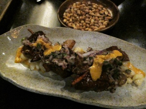 Anticuchos and choclos.